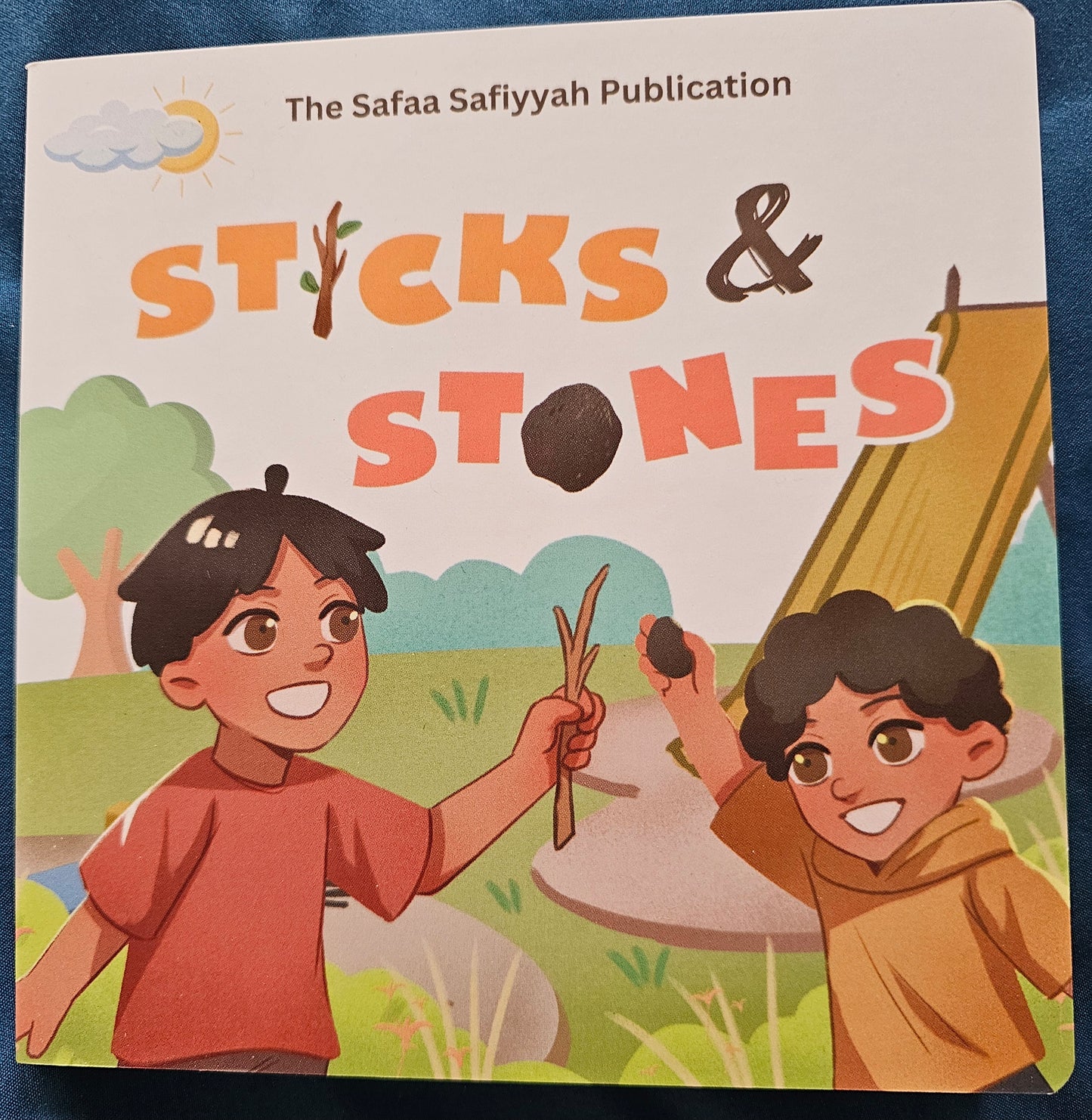 STICKS & STONES - A BILINGUAL BOARDBOOK