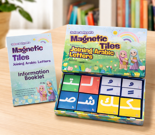 Magnetic tiles set with information booklet on a table